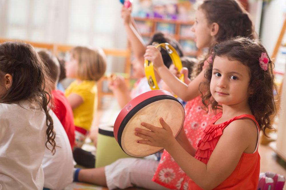 How does the Little People Musical Preschool stimulate the imagination